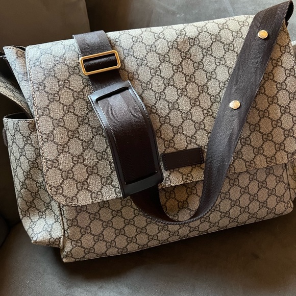 GG Supreme canvas diaper bag, with multiple pockets and...